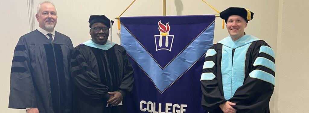 Dr. Donavan Bailey and two committee members